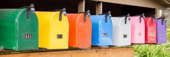 A row of colorful mailboxes